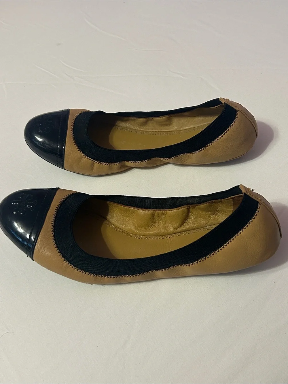 Tory Burch Two-Tone Cap-Toe Ballet Flats in Black & Tan